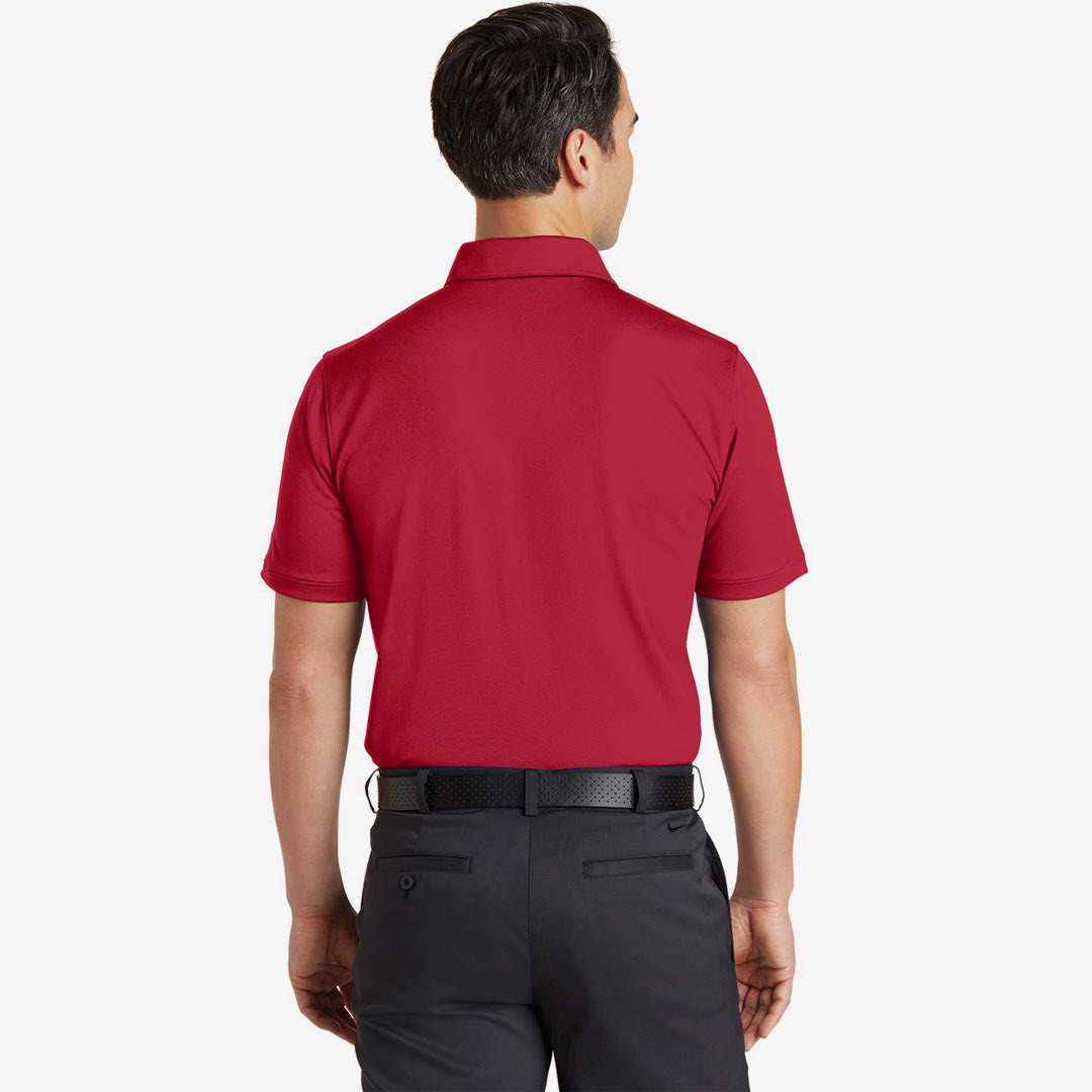 Man wearing Nike Men's Dri-FIT Solid Icon Pique Modern Fit Polo in Gym Red Back - 746099