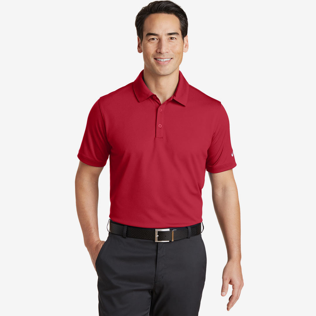 Man wearing Nike Men's Dri-FIT Solid Icon Pique Modern Fit Polo in Gym Red Front - 746099