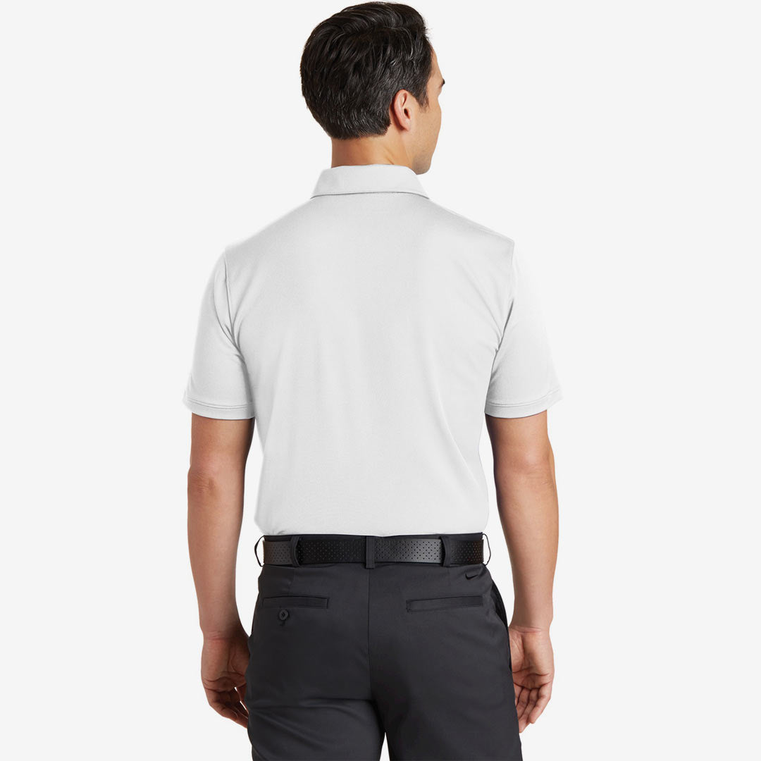 Man wearing Nike Men's Dri-FIT Solid Icon Pique Modern Fit Polo in White Back - 746099