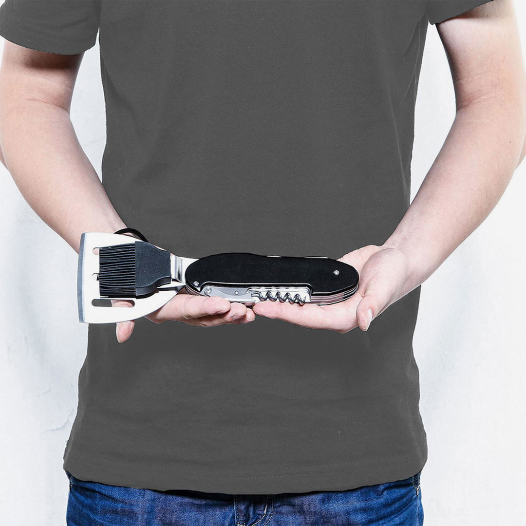 Man holding Nottage BBQ Multi Tool - 793