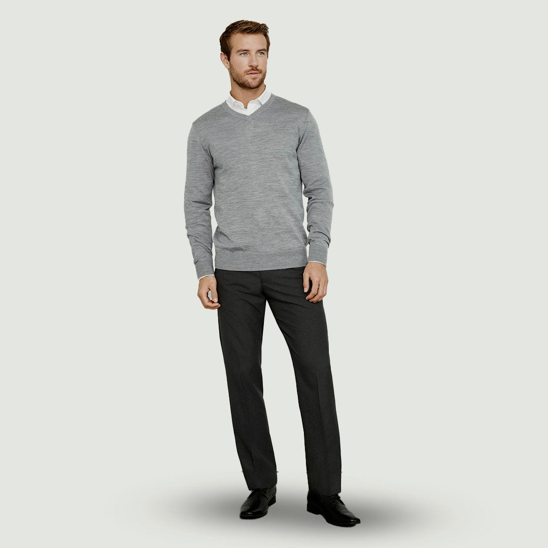 Man wearing Biz Collection Men's Classic Flat Front Pant in Charcoal - BS29210
