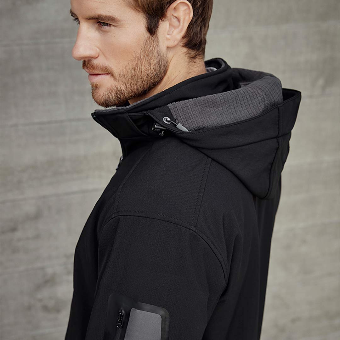 Man wearing Biz Collection Men's Summit Jacket in Black/Graphite Turn Detail - J10910