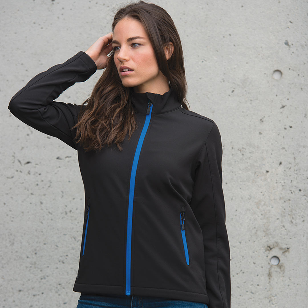 Woman wearing Stormtech Women's Orbiter Softshell Jacket in Black Azure/Blue - KSB-1W