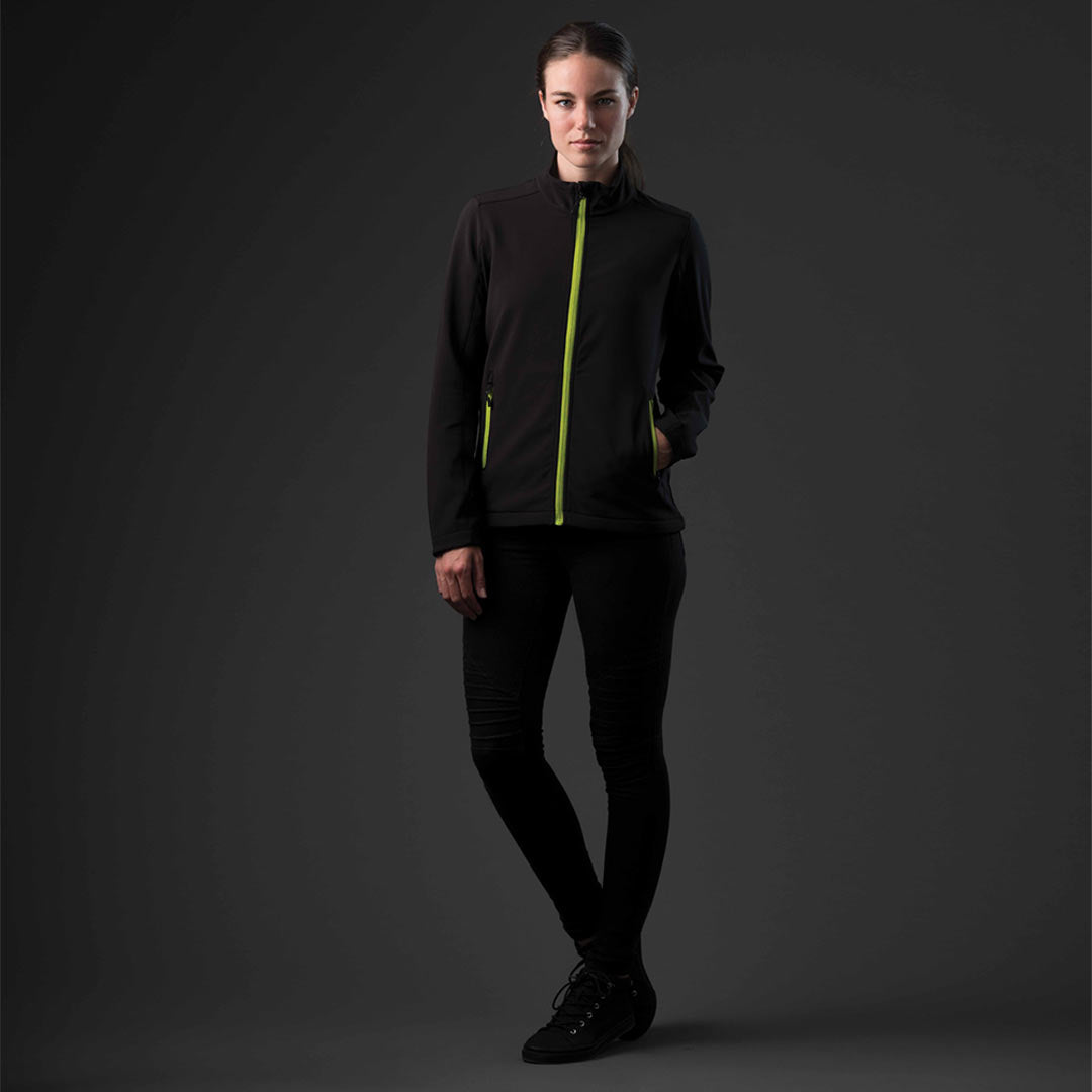 Woman wearing Stormtech Women's Orbiter Softshell Jacket in Black/Kiwi - KSB-1W