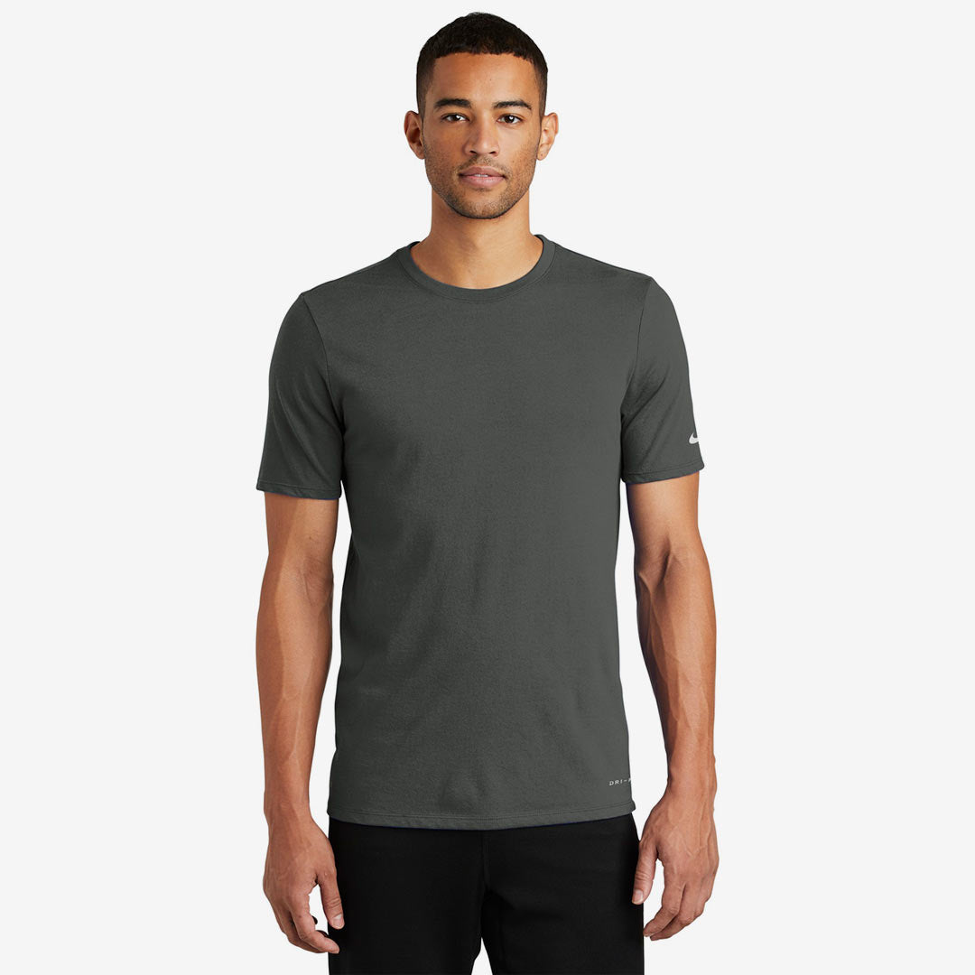 Man wearing Nike Men's Dri-FIT Cotton/Poly Tee in Anthracite Front - NKBQ5231