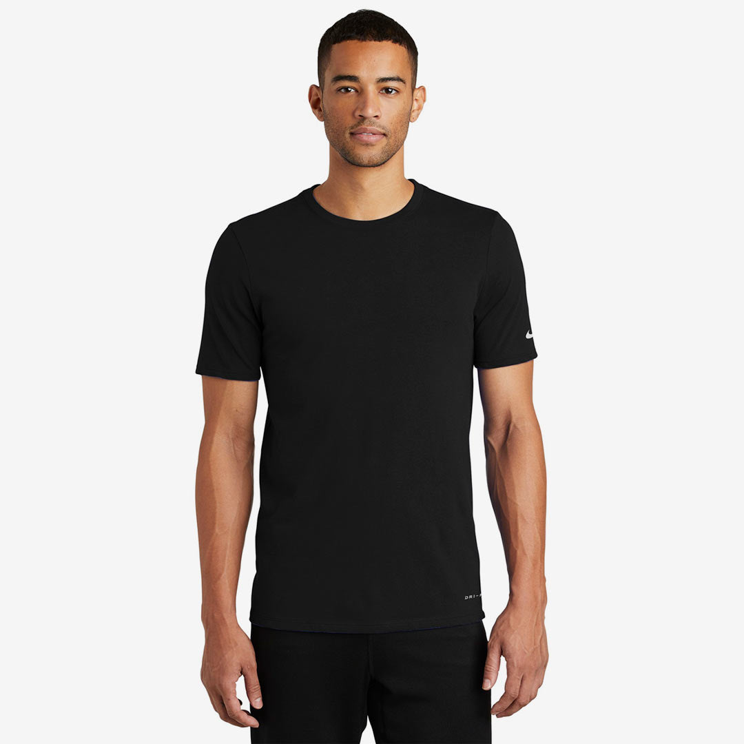 Man wearing Nike Men's Dri-FIT Cotton/Poly Tee in Black Front - NKBQ5231