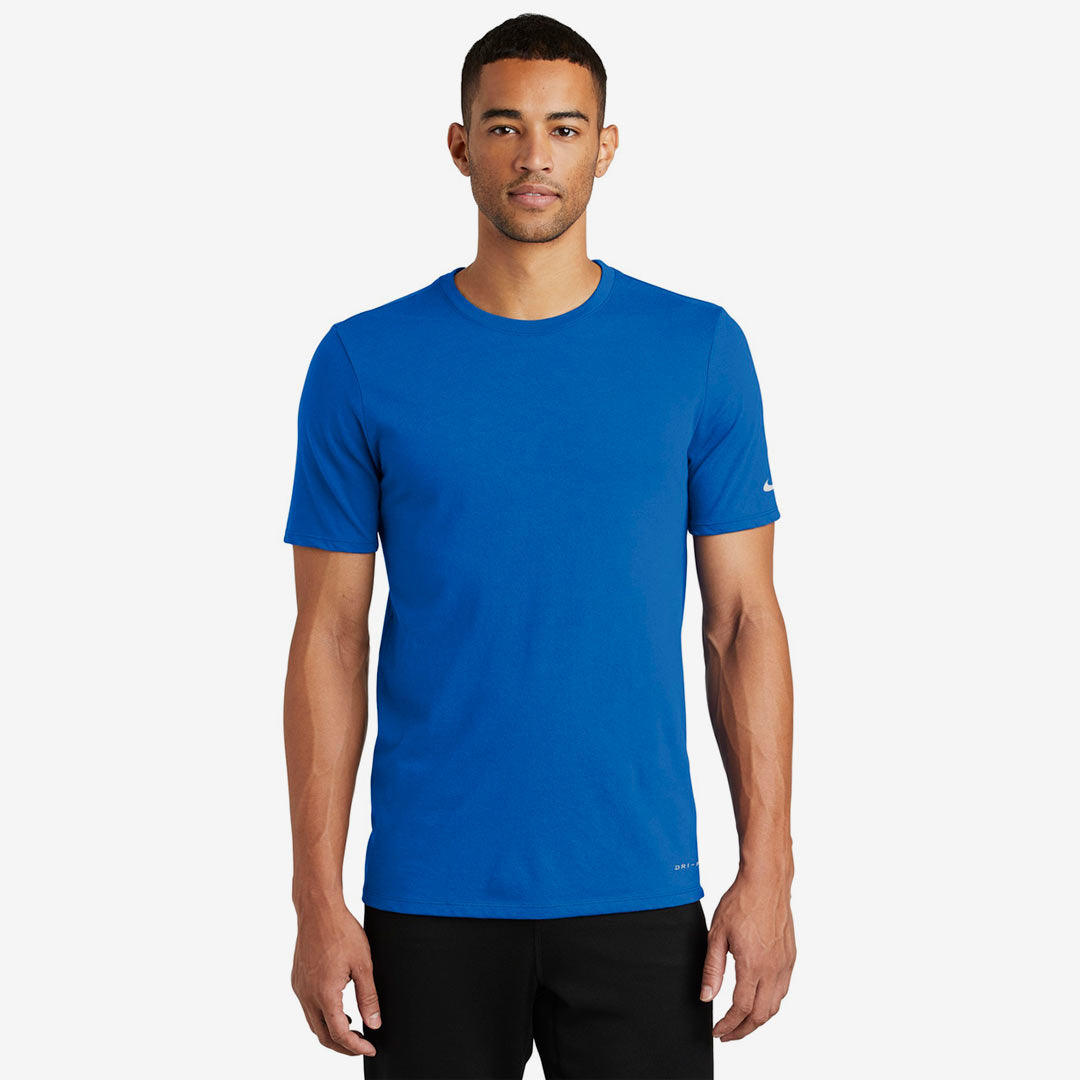 Man wearing Nike Men's Dri-FIT Cotton/Poly Tee in Game Royal Front - NKBQ5231