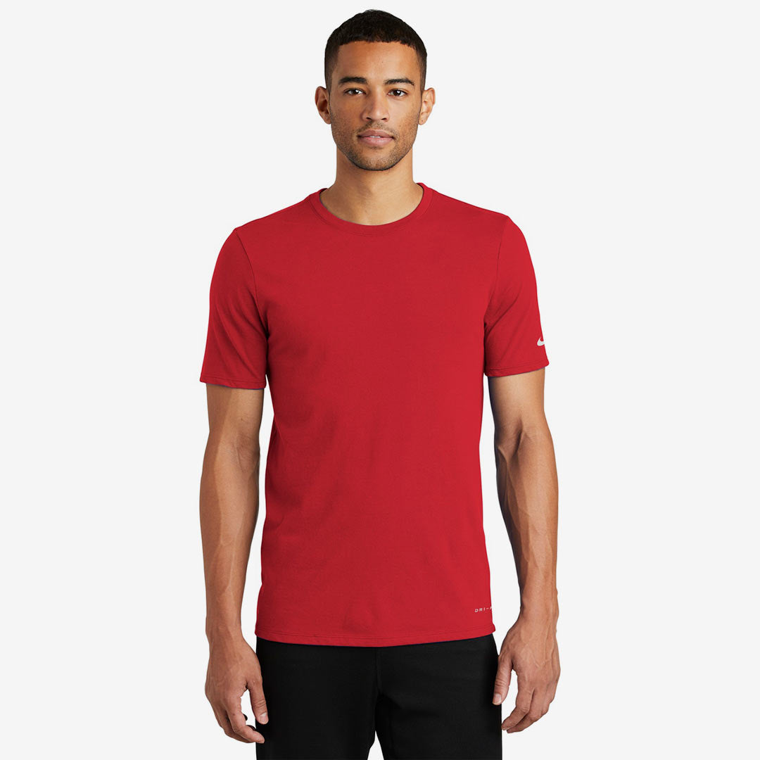 Man wearing Nike Men's Dri-FIT Cotton/Poly Tee in Gym Red Front - NKBQ5231