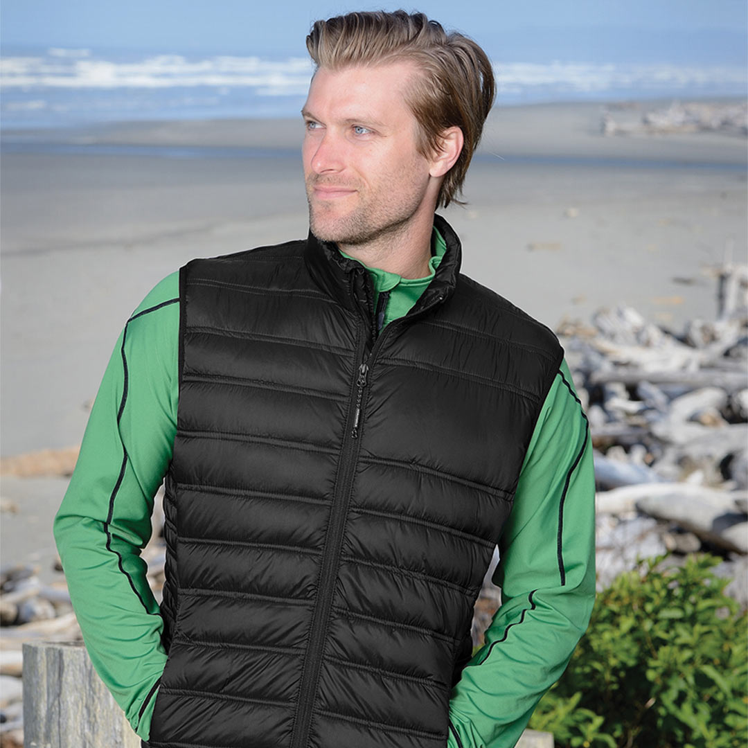 Man wearing Stormtech Men's Basecamp Thermal Puffer Vest in Black - PFV-4