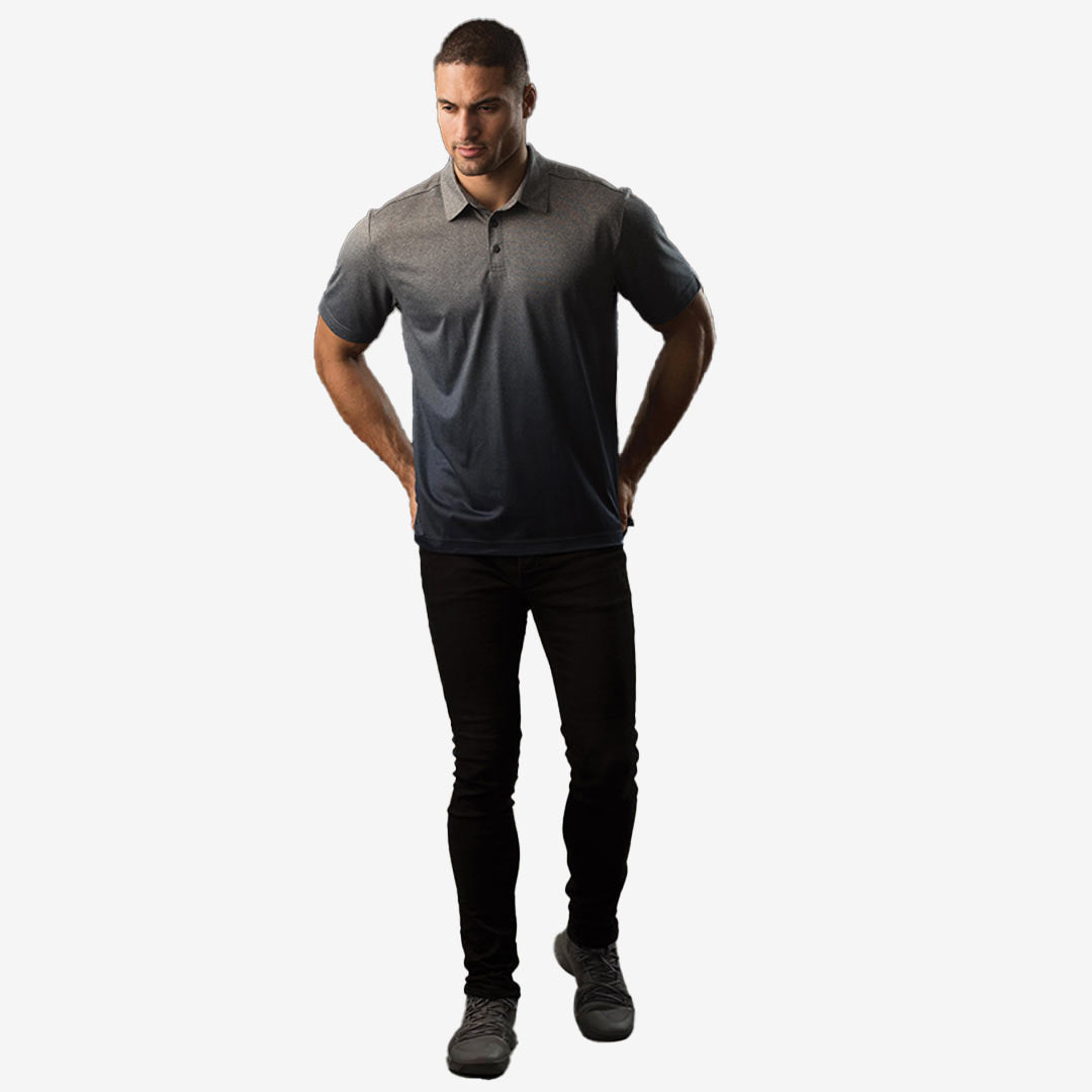 Man wearing Stormtech Men's Mirage Polo in Grey - TXR-1