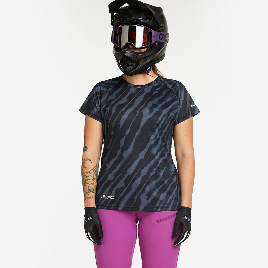Woman wearing DHaRCO Custom Branded Women's Short Sleeve Jersey in Jet Stream -LSS