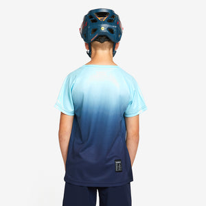 A kid wearing DHaRCO Custom Branded Youth Short Sleeve Jersey in In Deep Back Angle -YSS